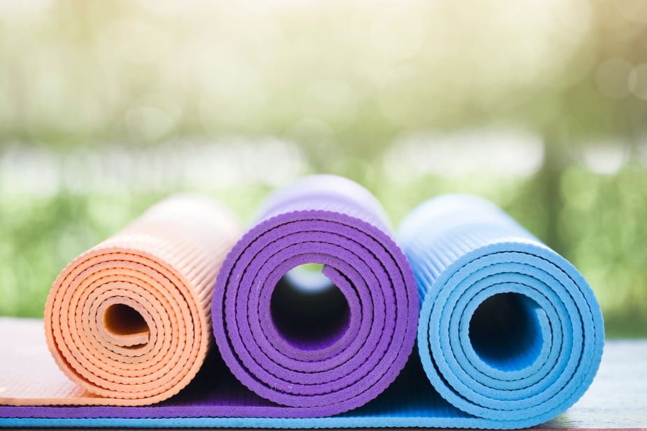 Eye-level view of a serene Pilates studio with calming colors and natural light